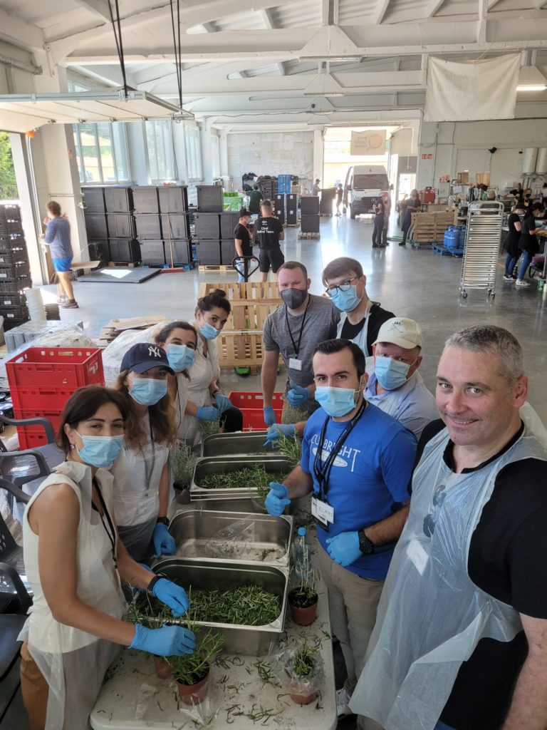 European members of the McCain Global Leaders program volunteer at World Central Kitchen on the border of Poland and Ukraine.