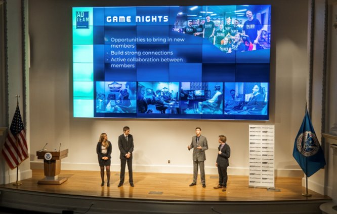 The Caliber Gaming Alliance team at Missouri State University present their project to a panel of judges during the June 2022 final competition in D.C.