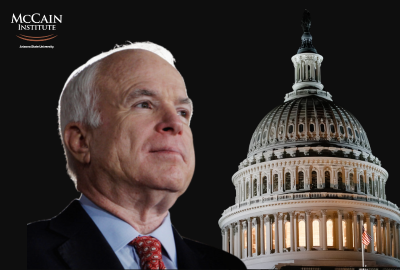 John McCain with Capitol building